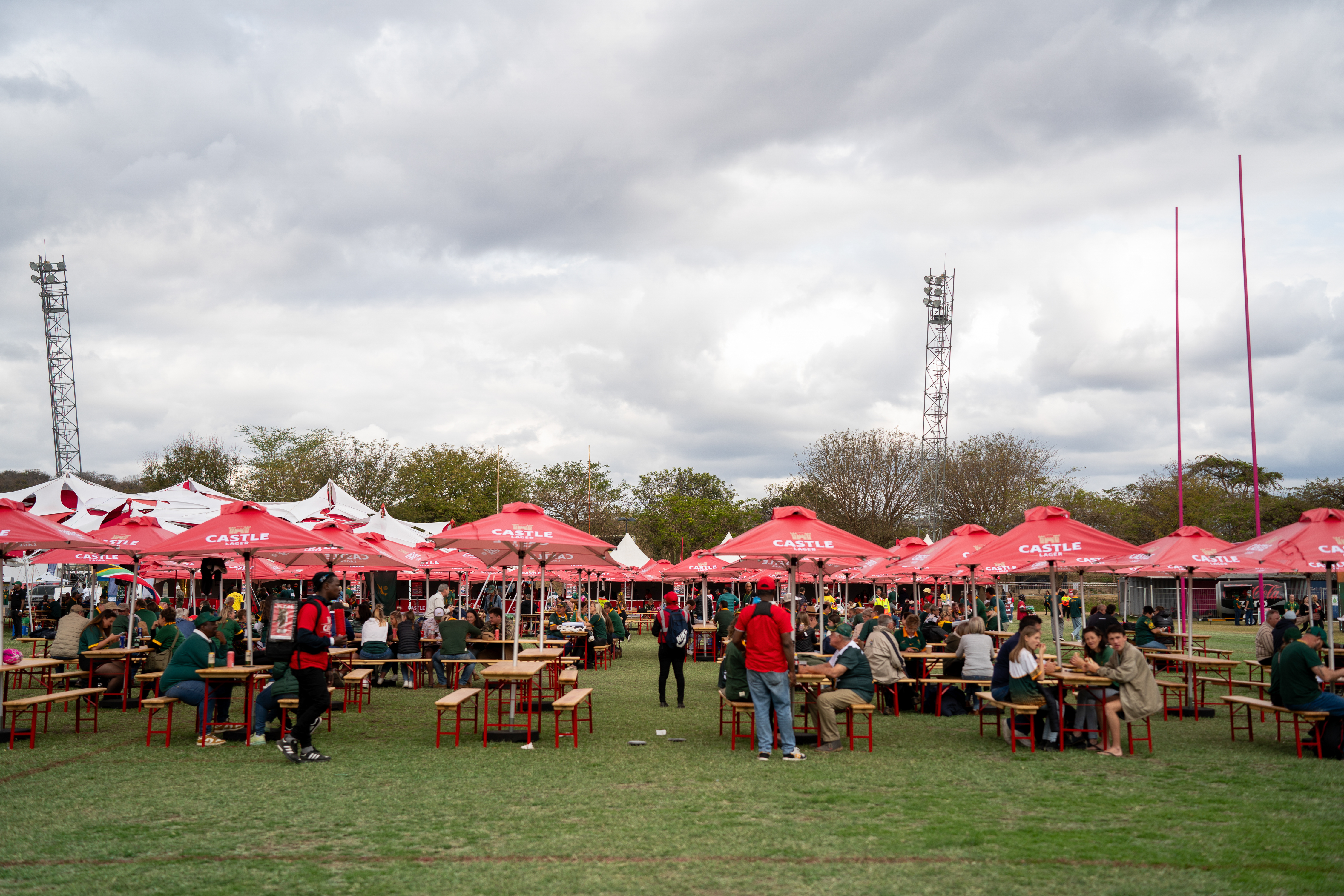 Professional Castle Lager gazebo setup at large outdoor South African sports venue